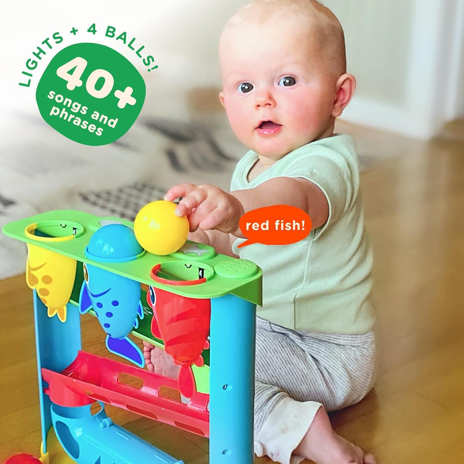 Juguete Interactivo Move2Play para Bebés 6+ Meses - Alimenta al Pez