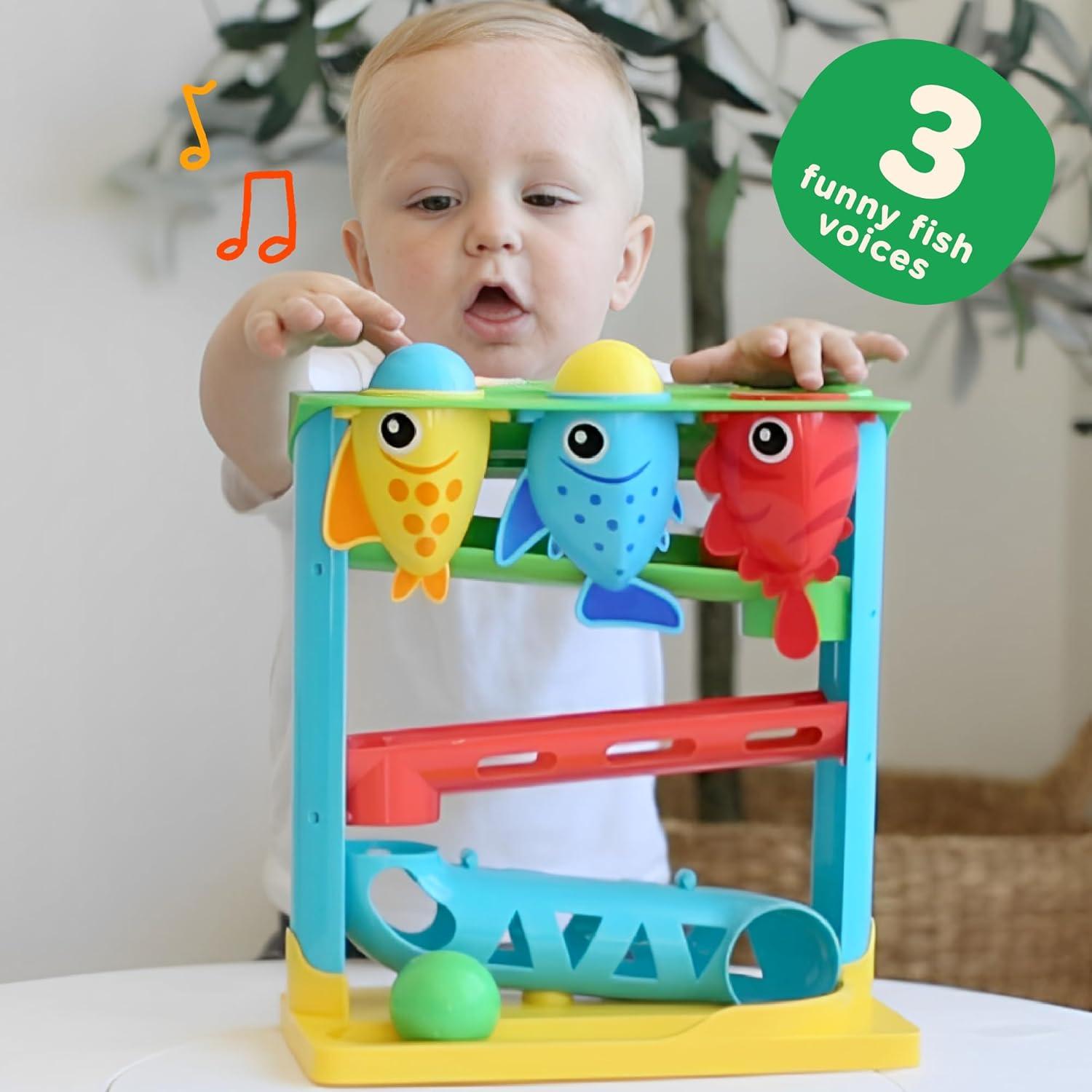 Juguete Interactivo Move2Play para Bebés 6+ Meses - Alimenta al Pez