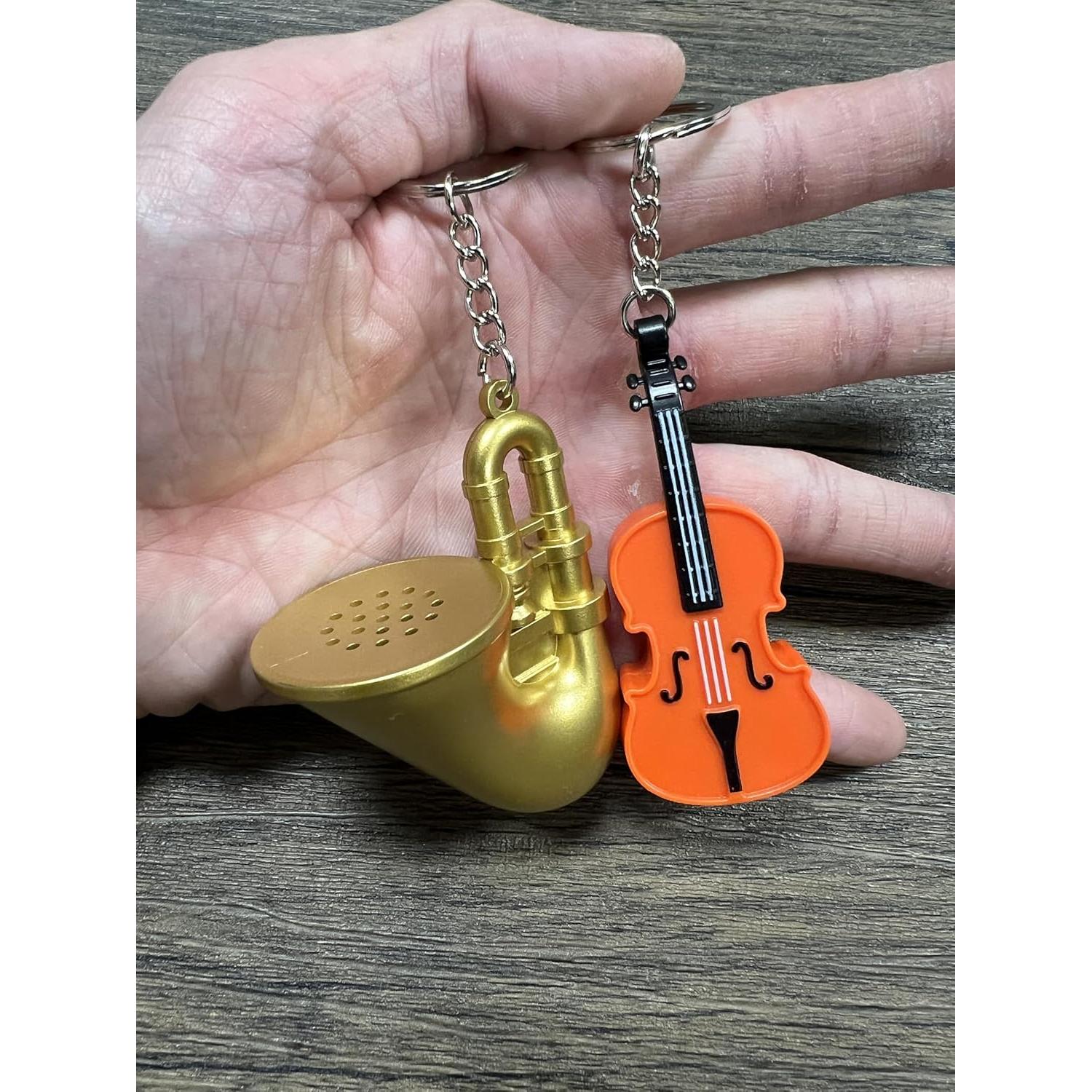 Llavero Juguete MunnyGrubbers Violín y Trompeta Triste