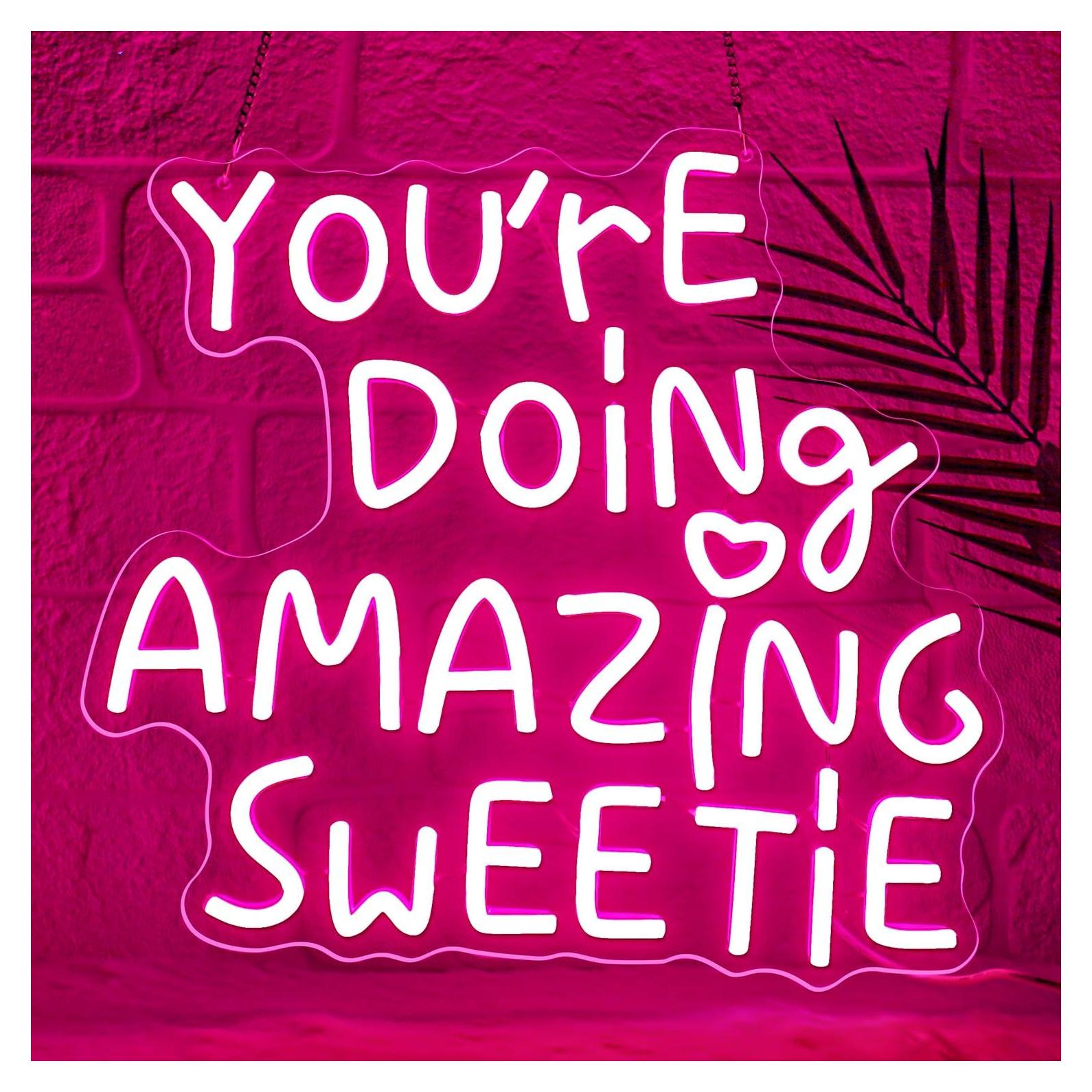 Letrero Neón LED Rosa Sneignon 'Estás Haciendo Algo Increíble' 35.6x33.4 cm