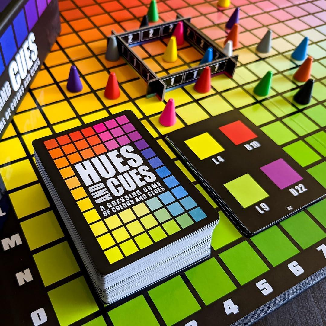 Juego de mesa Hues y Cues USAopoly - Adivina colores 3-10 jugadores
