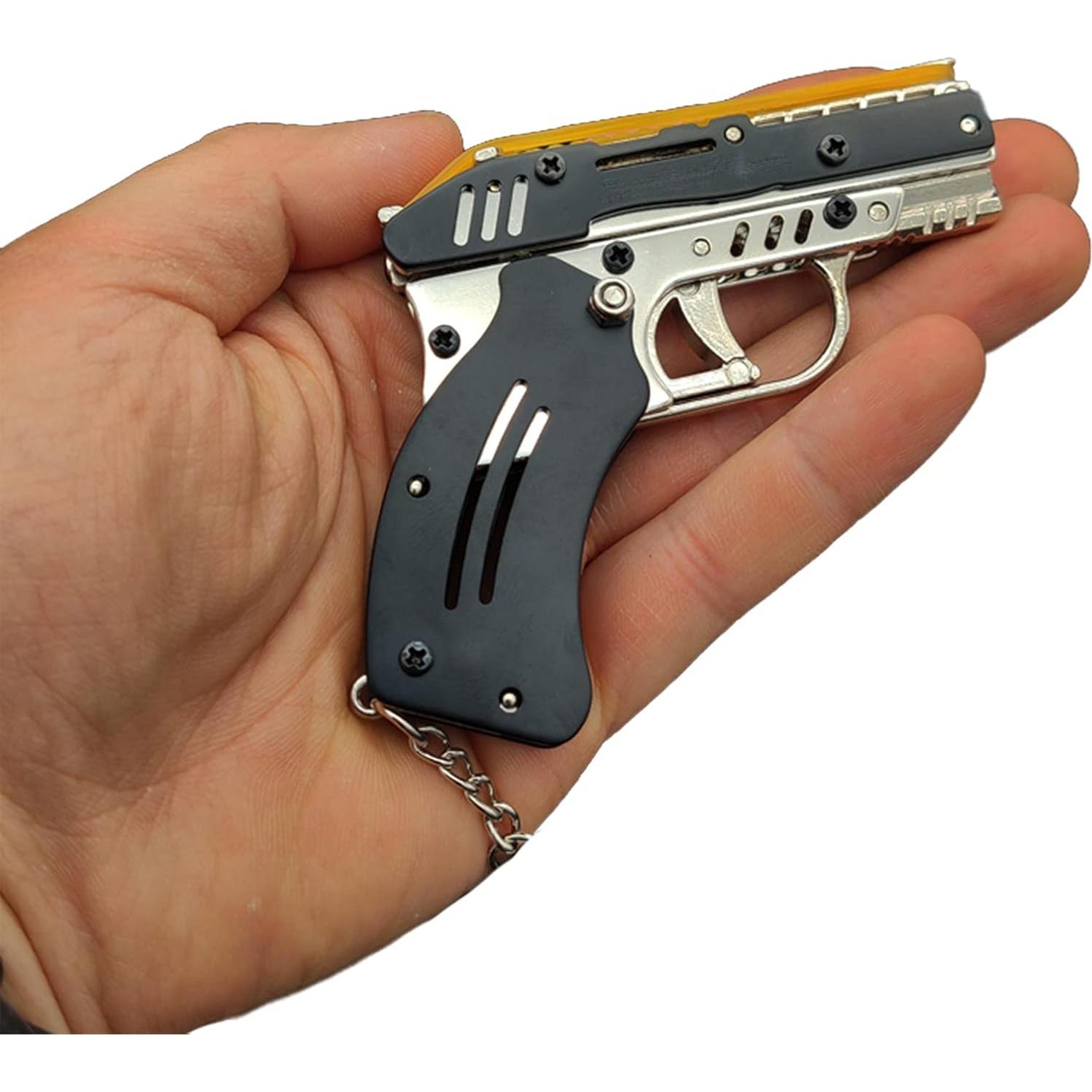 Pistola de Goma Mini Metal Plegable Juguete Adultos Niños