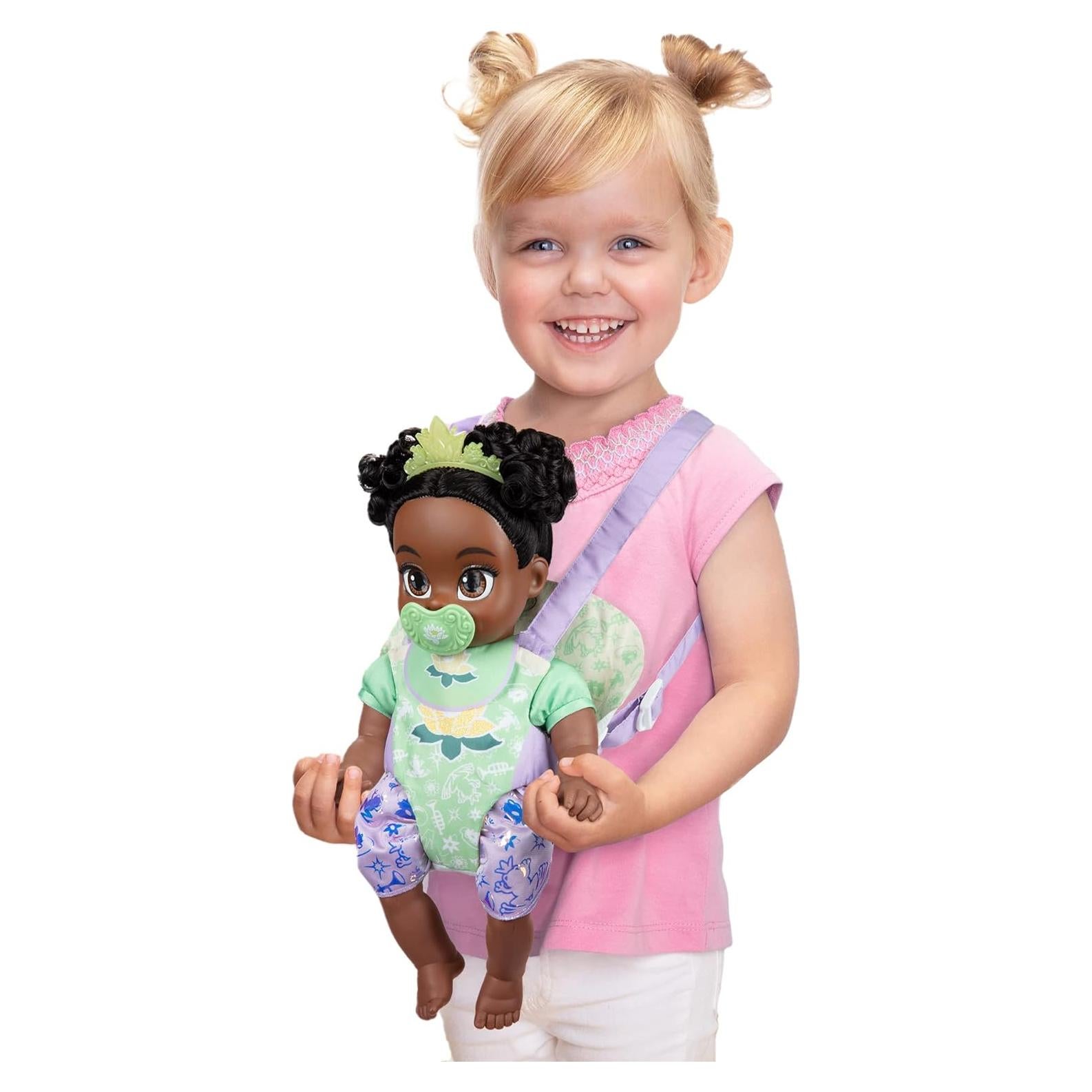 Muñeca Bebé Tiana Deluxe Disney con Transportador y Amigo