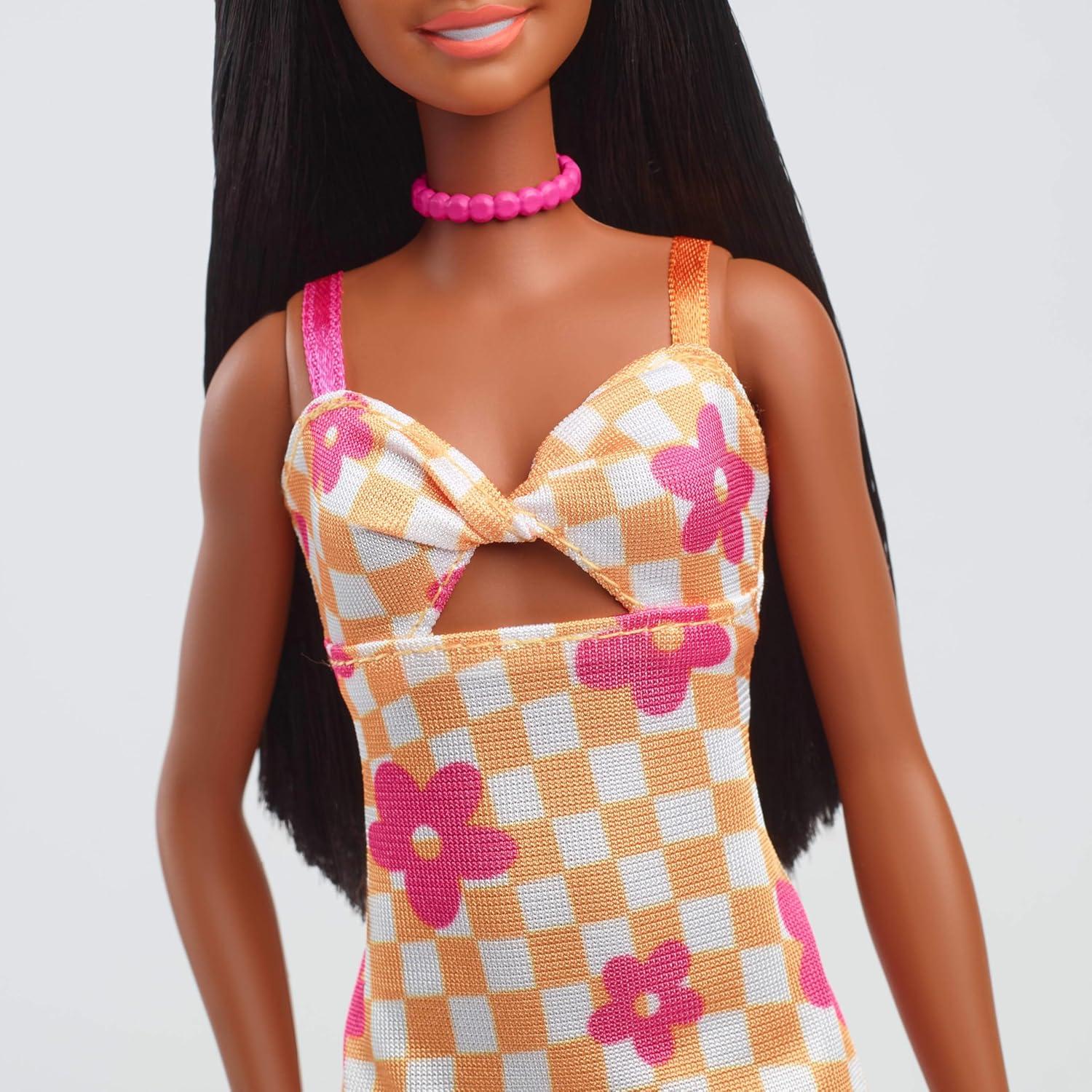 Muñeca Barbie Fashionistas #233 con vestido midi naranja y flores
