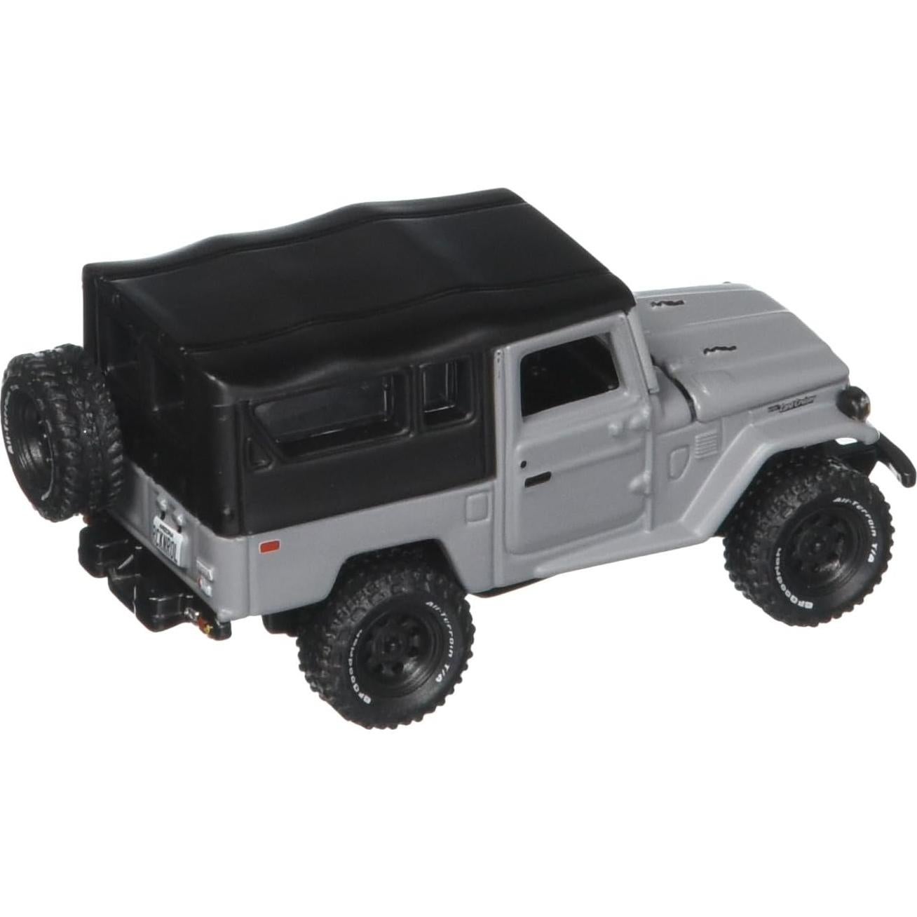 Auto a Escala 1:64 Johnny Lightning Toyota Land Cruiser Gris