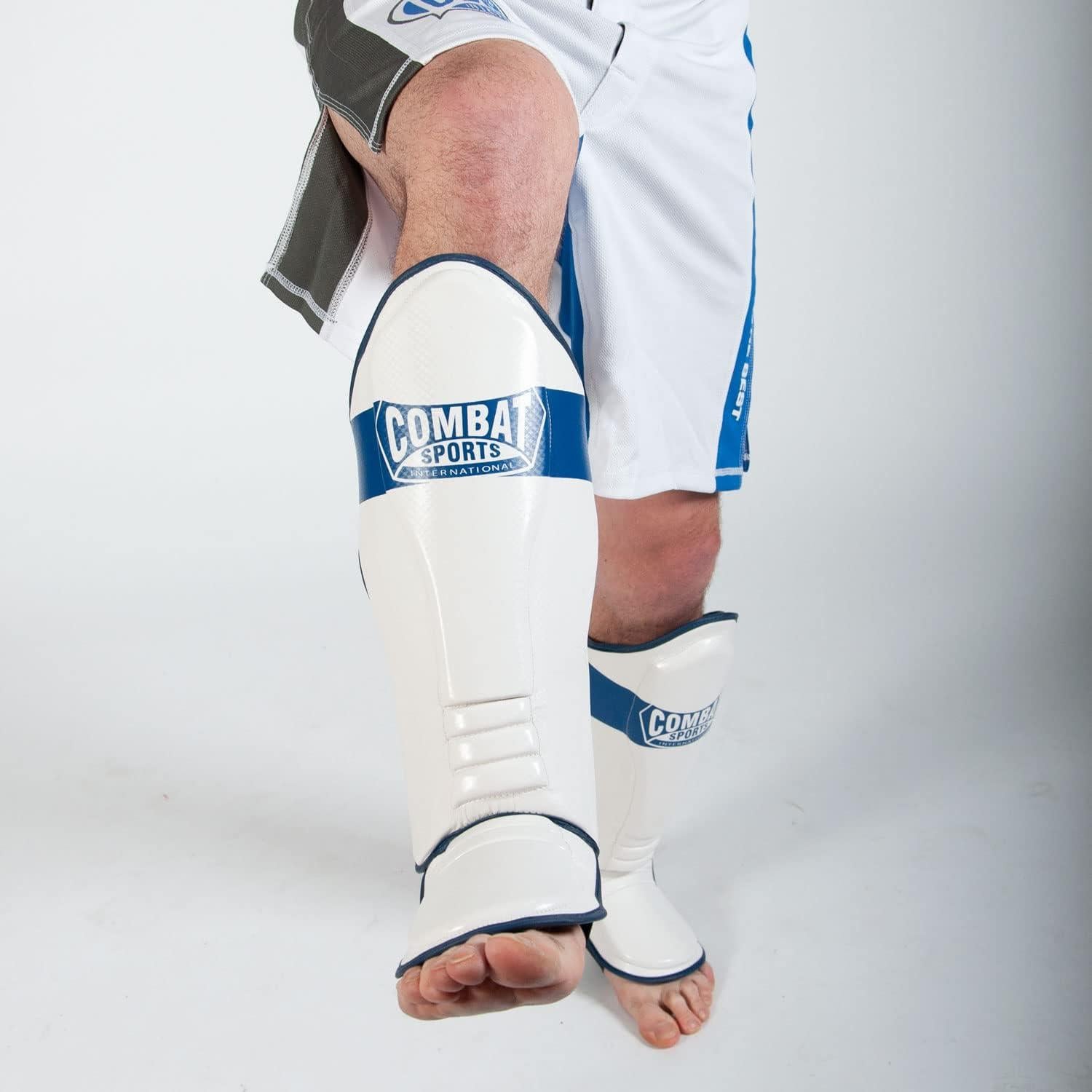 Protectores de Espinillas Combat Sports MMA - Negro