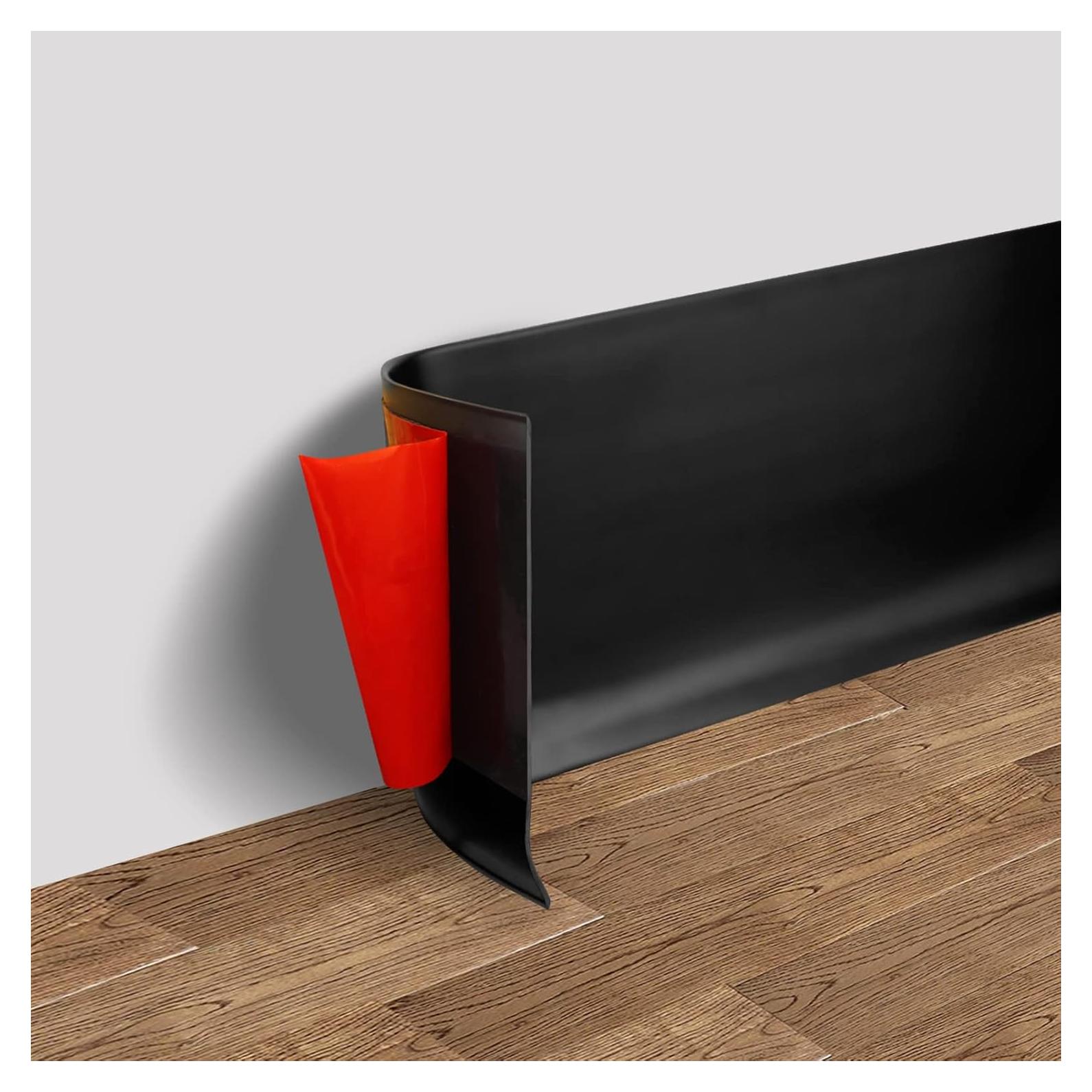Base de Pared Autoadhesiva FONUNO 4" x 609.6 cm PVC Negro