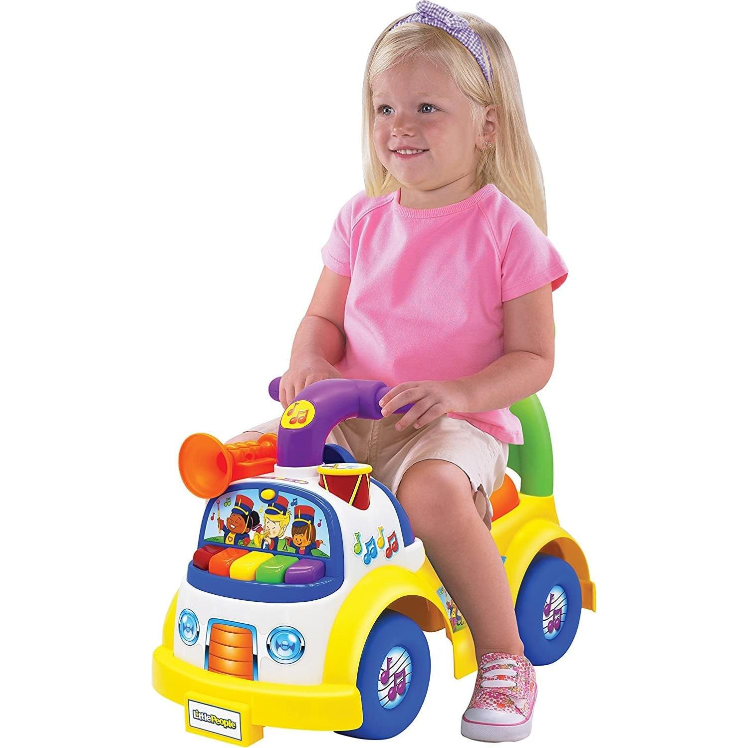 Fisher-Price Little People Music Parade Ride-On, Plays 5 Marching Tunes & Other Sounds! Perfect for Toddler Boys & Girls Ages 1, 2, & 3 Years Old - Helps Foster Motor Skills [Amazon Exclusive]