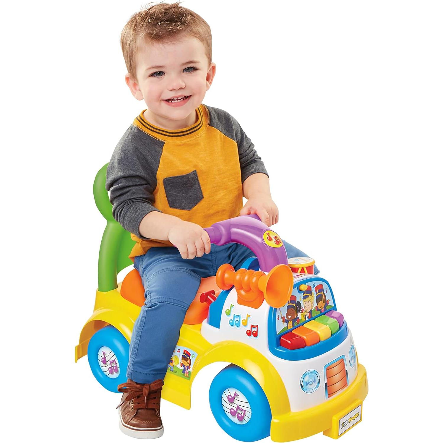 Fisher-Price Little People Music Parade Ride-On, Plays 5 Marching Tunes & Other Sounds! Perfect for Toddler Boys & Girls Ages 1, 2, & 3 Years Old - Helps Foster Motor Skills [Amazon Exclusive]