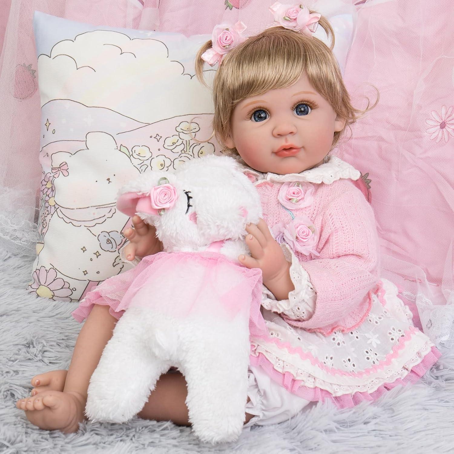 Muñeca Aori Reborn 55.88 cm Realista para Niños 3+ con Atuendo Rosa