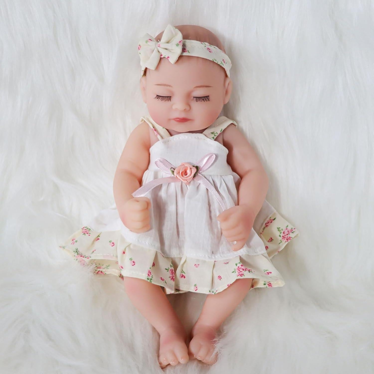 Muñeca Reborn Niña JURONG 25 cm Vinilo Suave con Vestido