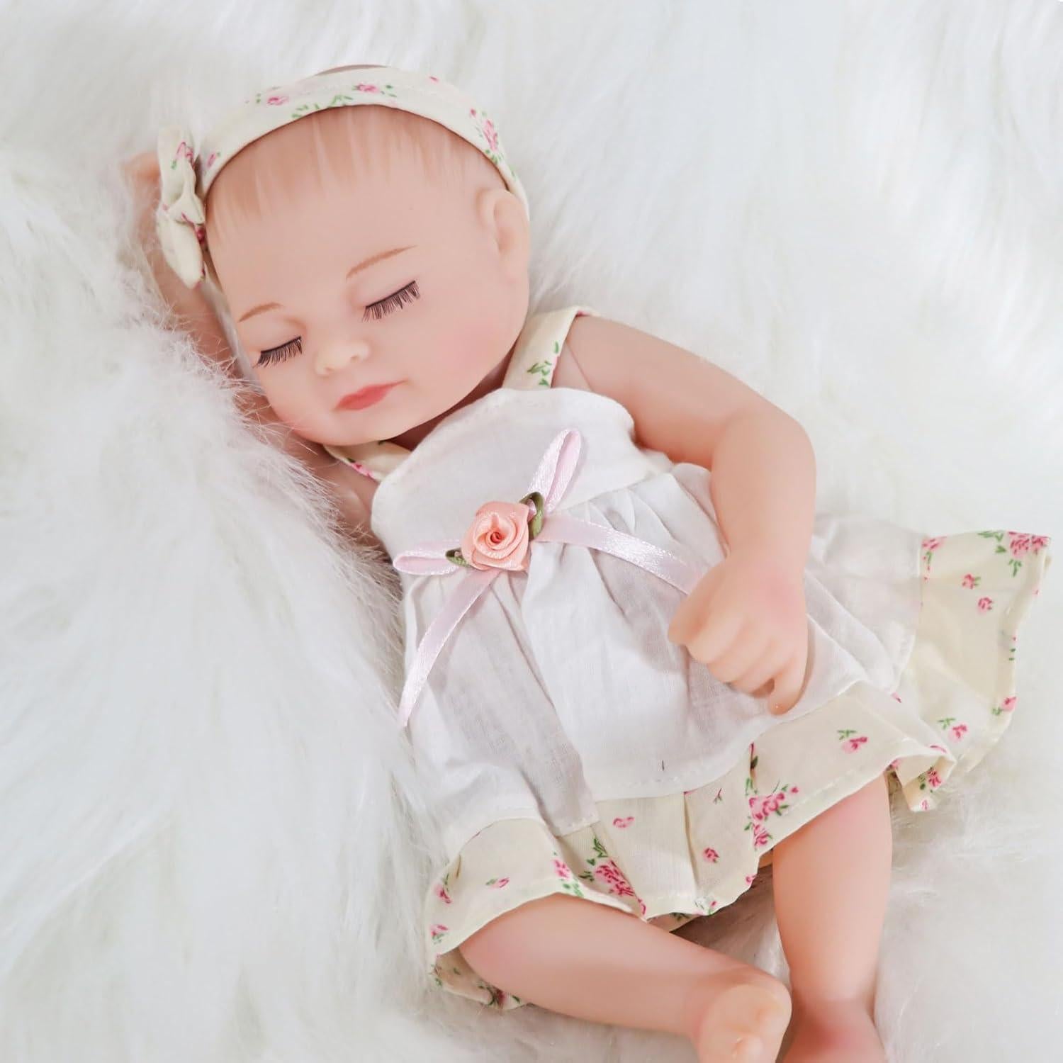 Muñeca Reborn Niña JURONG 25 cm Vinilo Suave con Vestido