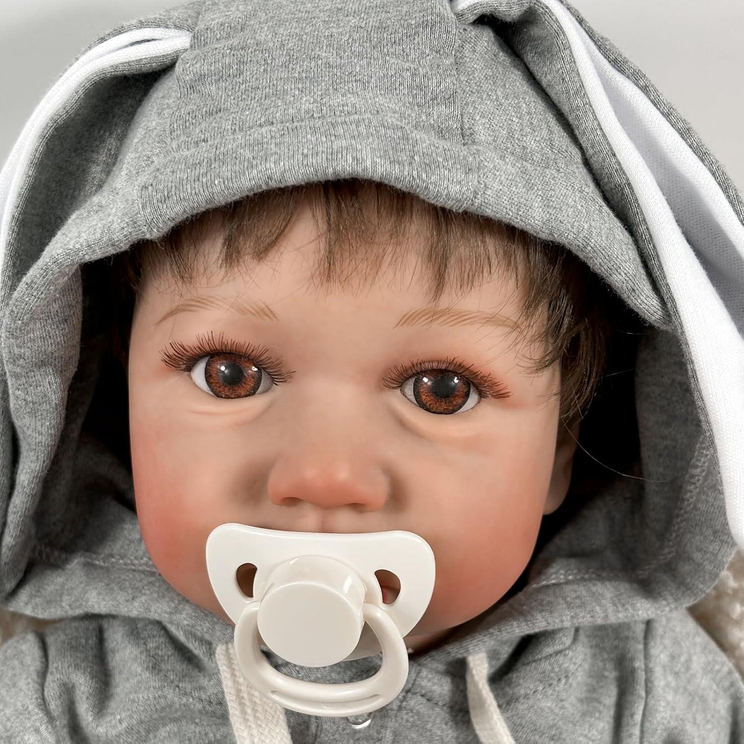 Muñeca de bebé renacida JURONG 22 pulgadas con mono gris