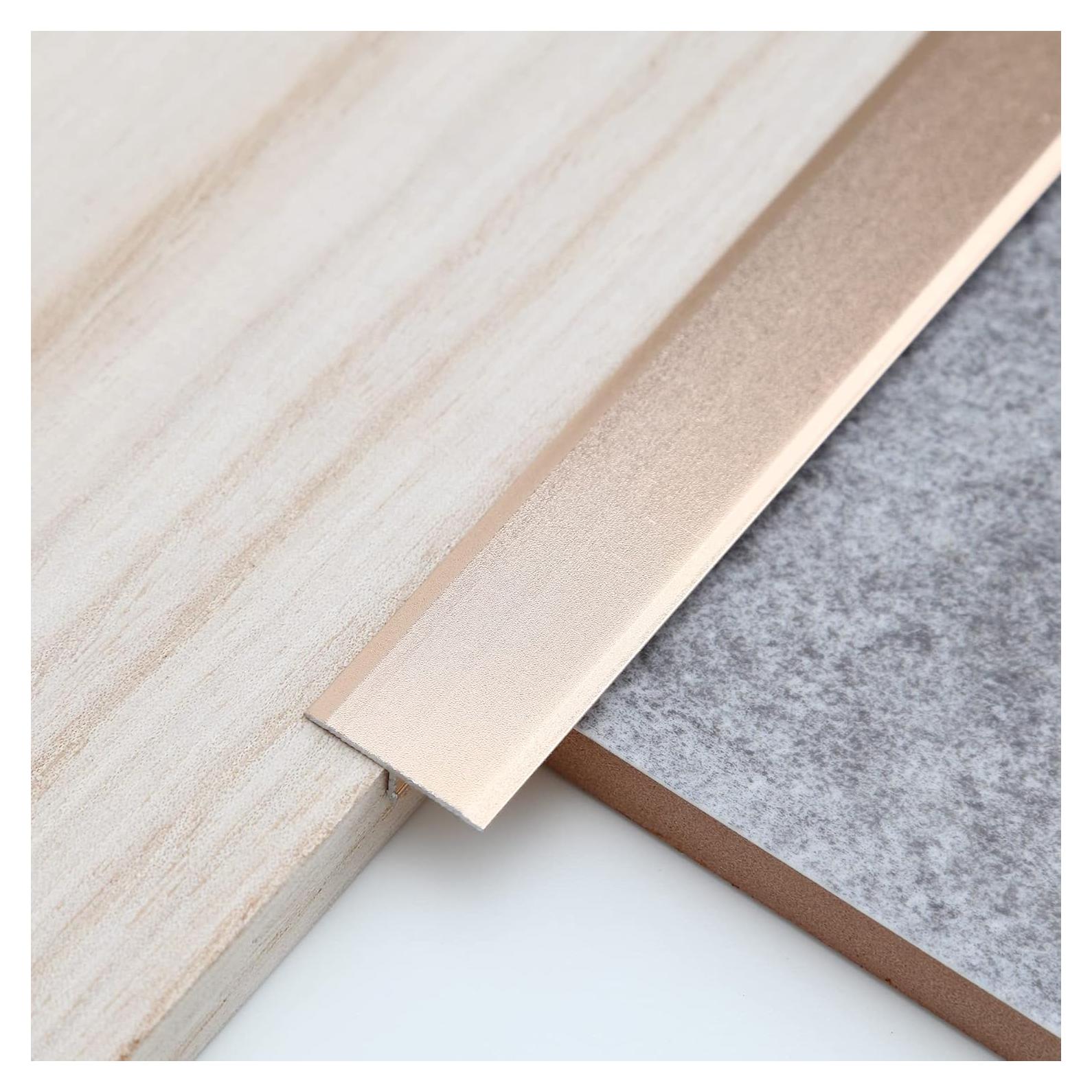 Tira de Moldura de Aluminio en T Trimold 0.9m Oro Mate