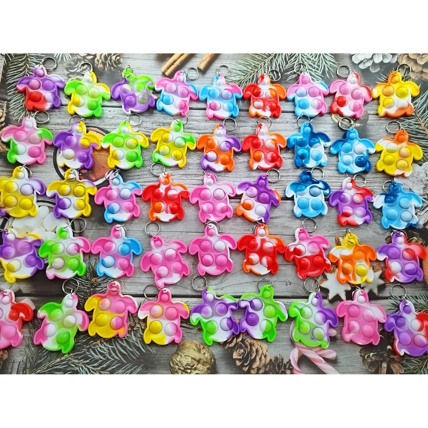 100 Llaveros Mini Tortugas Pop Fidget HOZKEAP - Juguetes para Niños