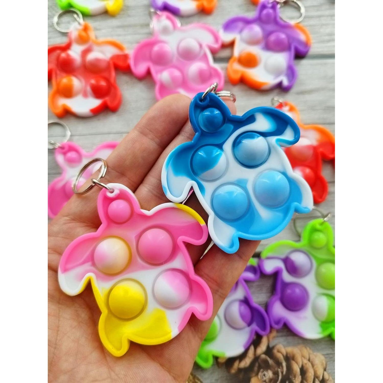 100 Llaveros Mini Tortugas Pop Fidget HOZKEAP - Juguetes para Niños