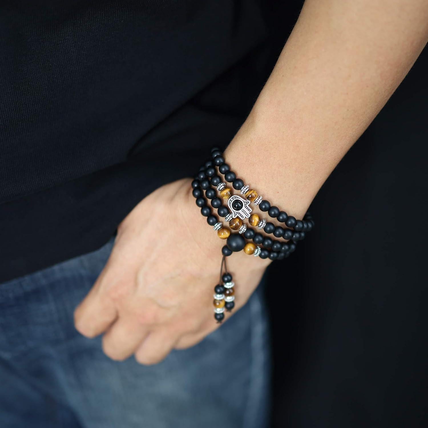 Pulsera Mala COAI 108 Cuentas de Ónix Mate y Hamsa