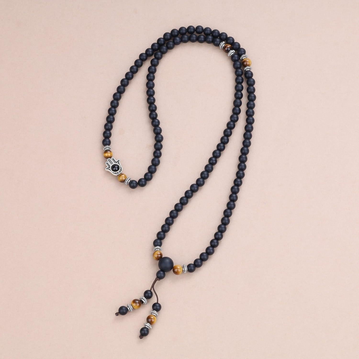 Pulsera Mala COAI 108 Cuentas de Ónix Mate y Hamsa