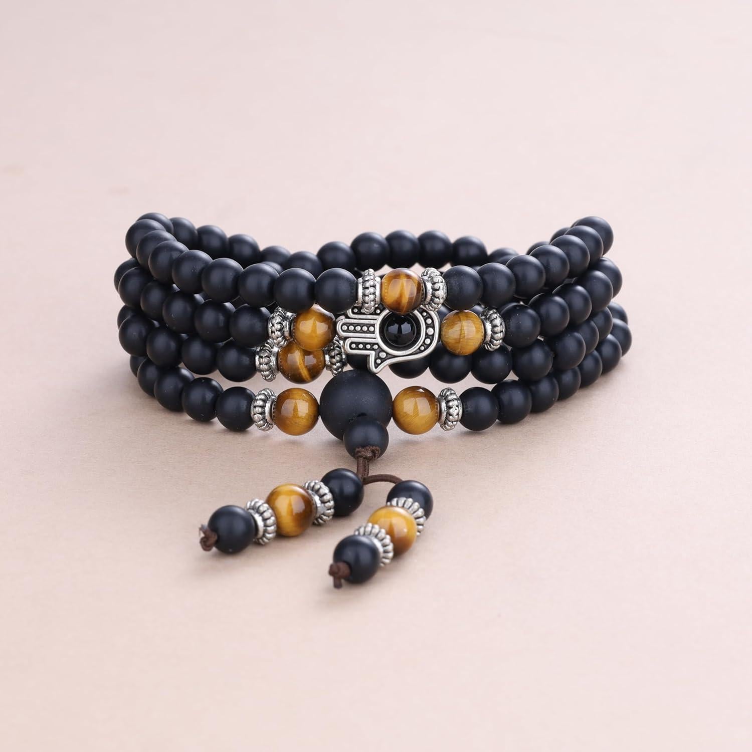 Pulsera Mala COAI 108 Cuentas de Ónix Mate y Hamsa