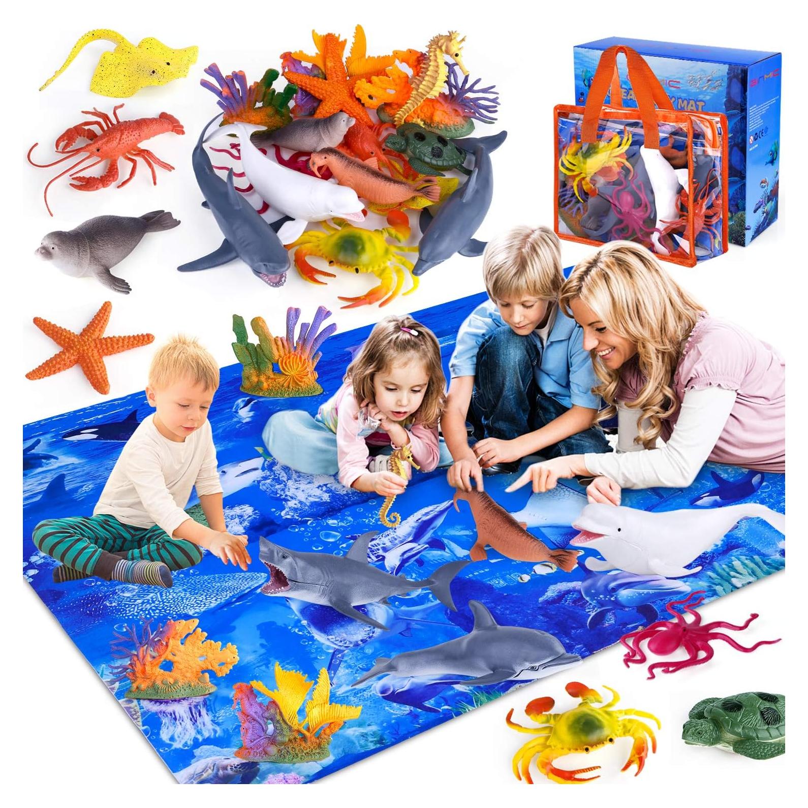 Juguetes de Animales Marinos GINMIC 18 Piezas con Alfombrilla