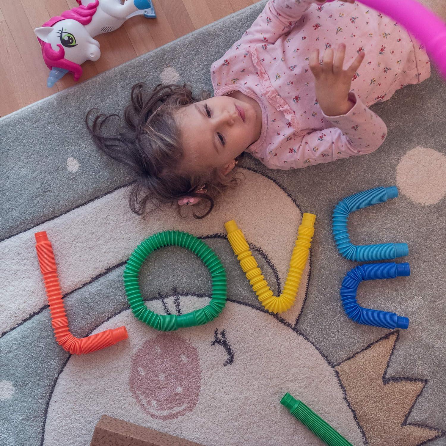 Paquete Juguetes Sensoriales Nutty Toys - Animales de Granja y Tubos Pop