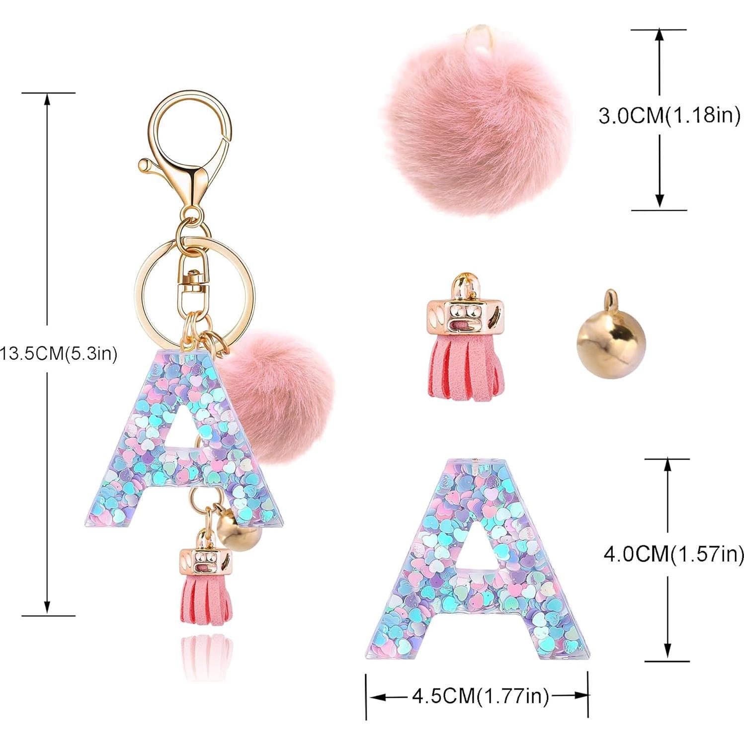 Llave de letra A de resina con bola de pelo rosa para llavero