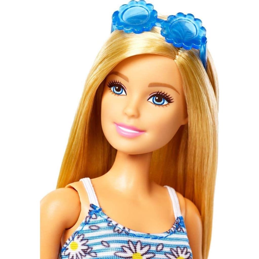 Muñeca Barbie con 4 looks y accesorios de moda Mattel