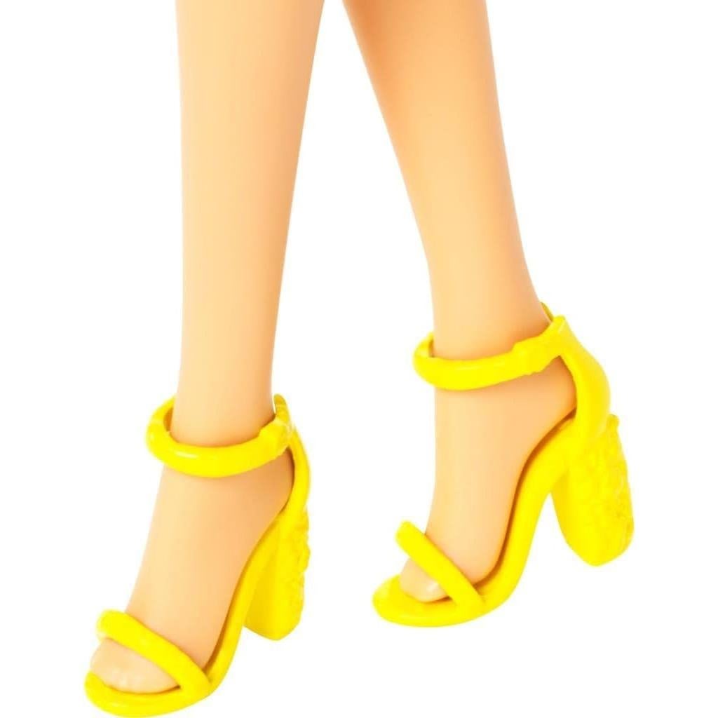 Muñeca Barbie con 4 looks y accesorios de moda Mattel