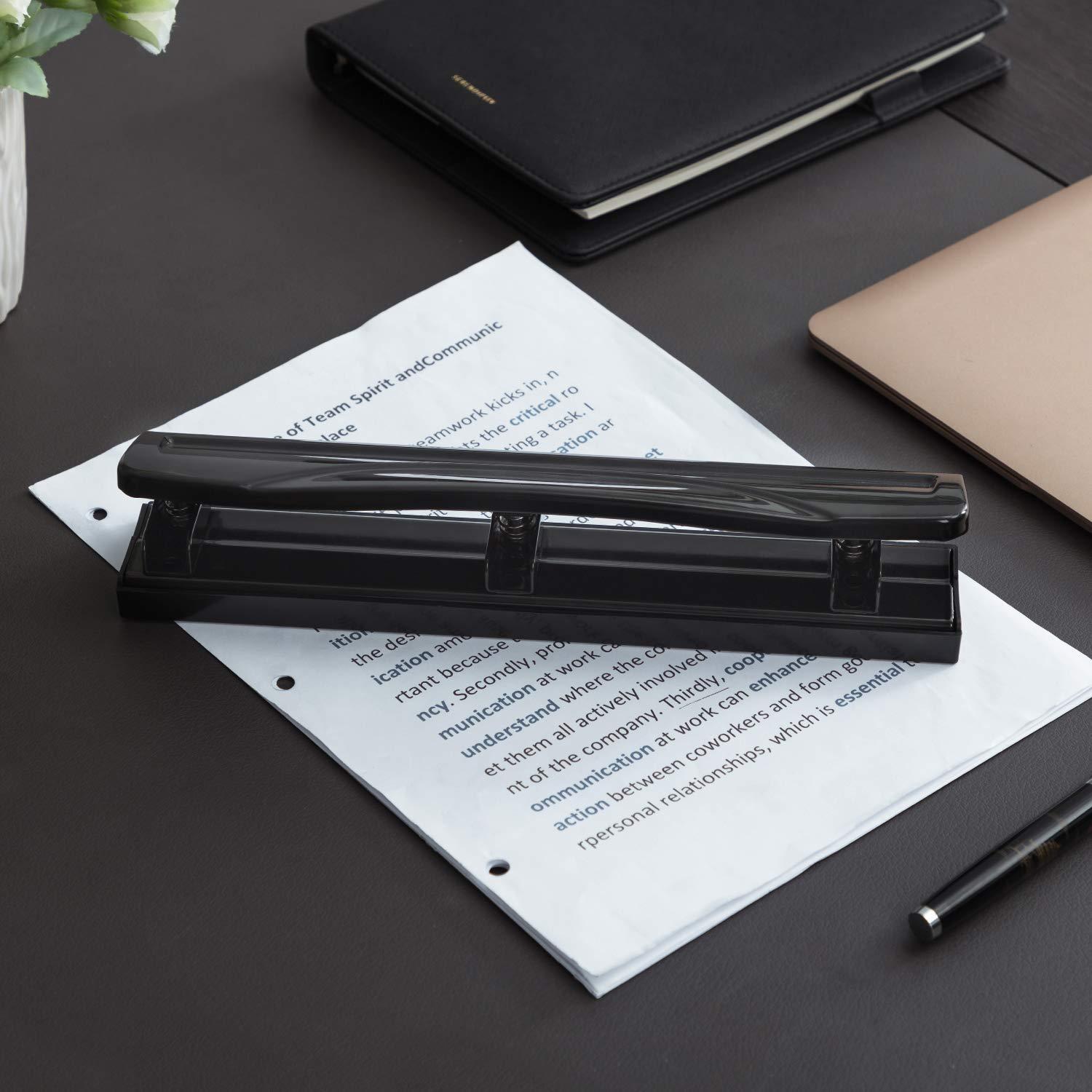 Perforadora de 3 agujeros Amazon Basics, capacidad 10 hojas, negra