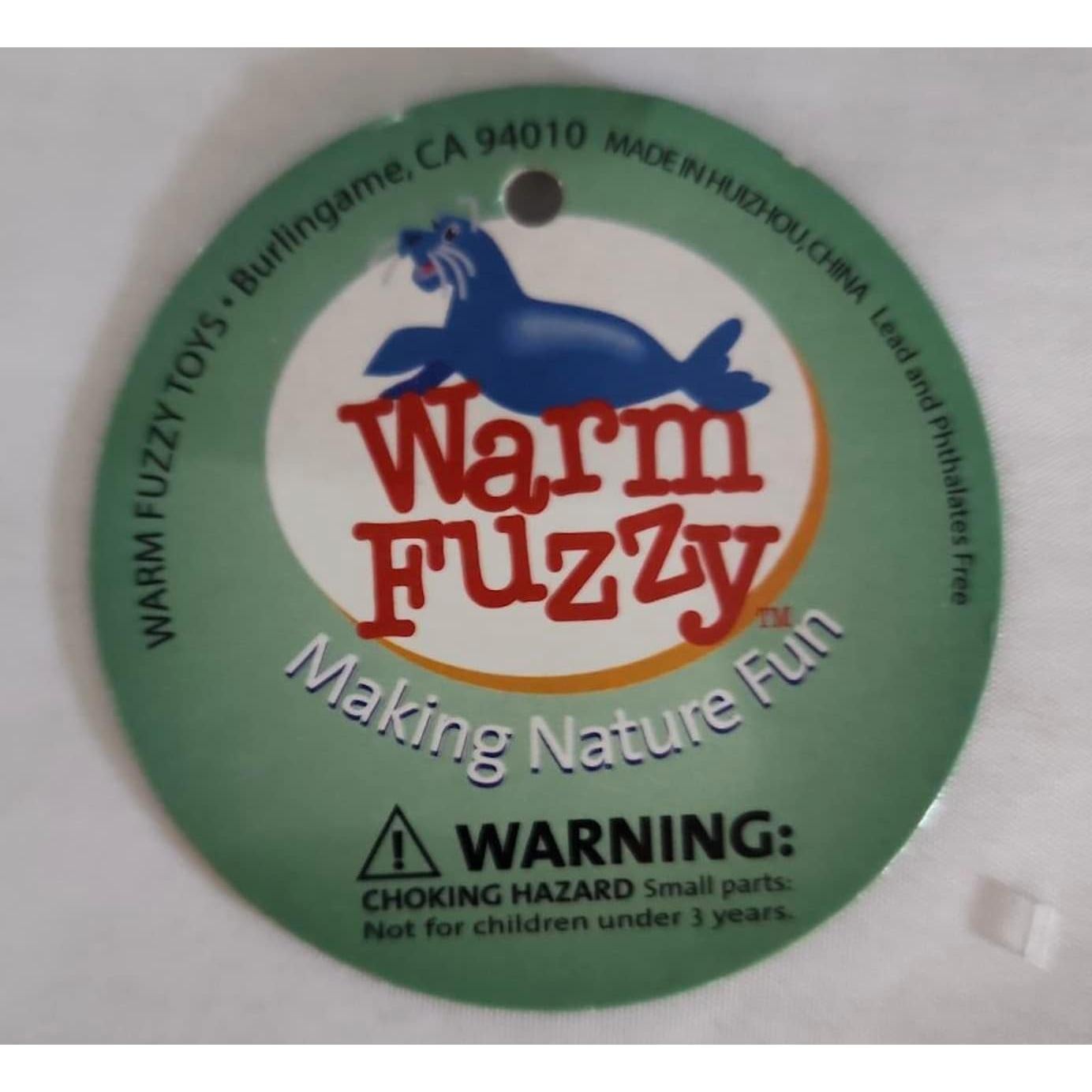 Dinosaurio Aplastable Warm Fuzzy | Juguete Antiestrés 17.78 cm