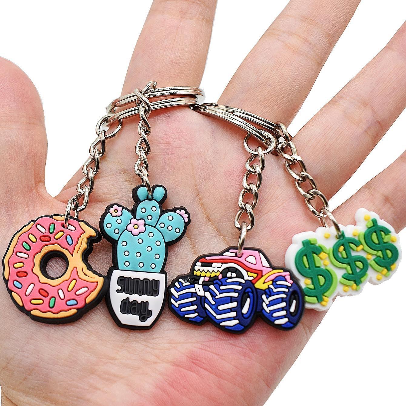 Lote de 20 llaveros variados Papacharms para fiesta y premios