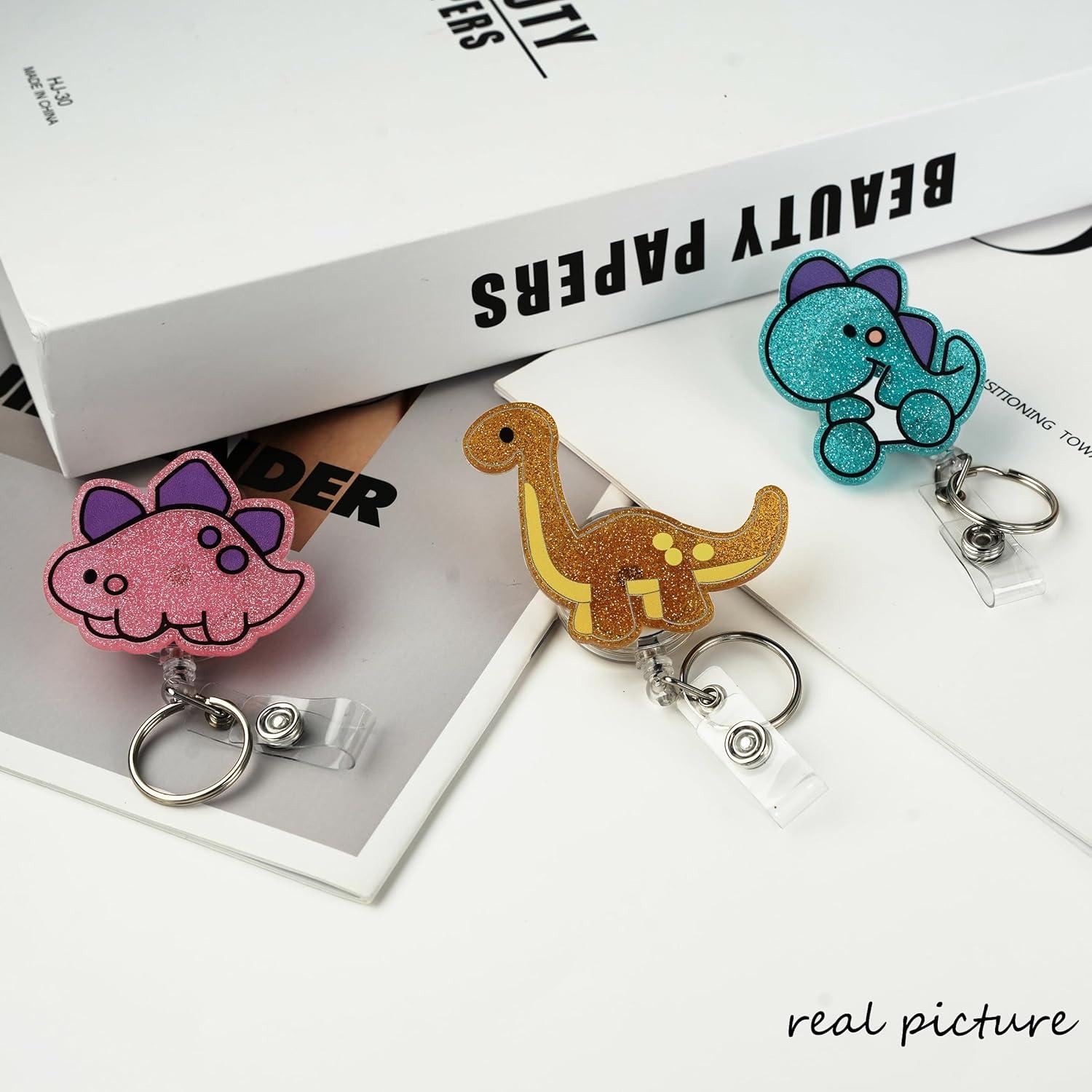 Reel de Insignia Retráctil HLQHXWHZT - Dinosaurio Ctue - 3 Piezas