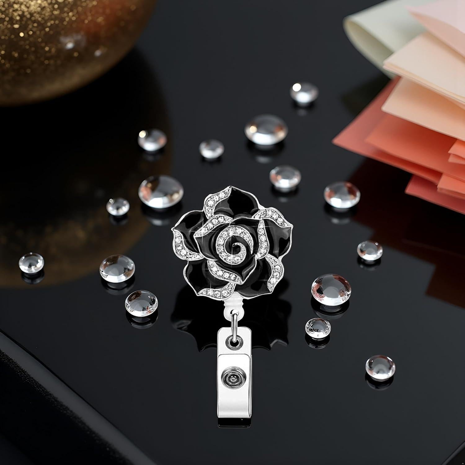 Portatarjetas Retráctil Sluswallow Negro con Flor Rosa Brillante