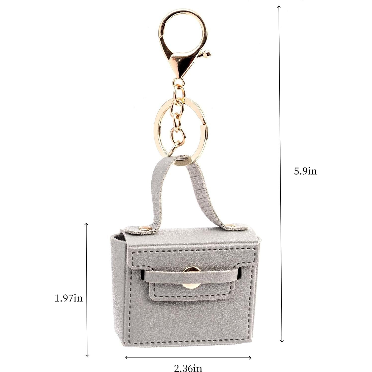 Llavero de bolso mini de cuero PU gris con charms para mujer