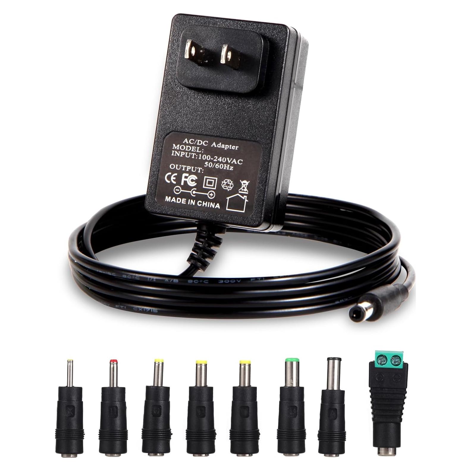 Adaptador de corriente 9V 1A FSQWUR con 8 enchufes intercambiables