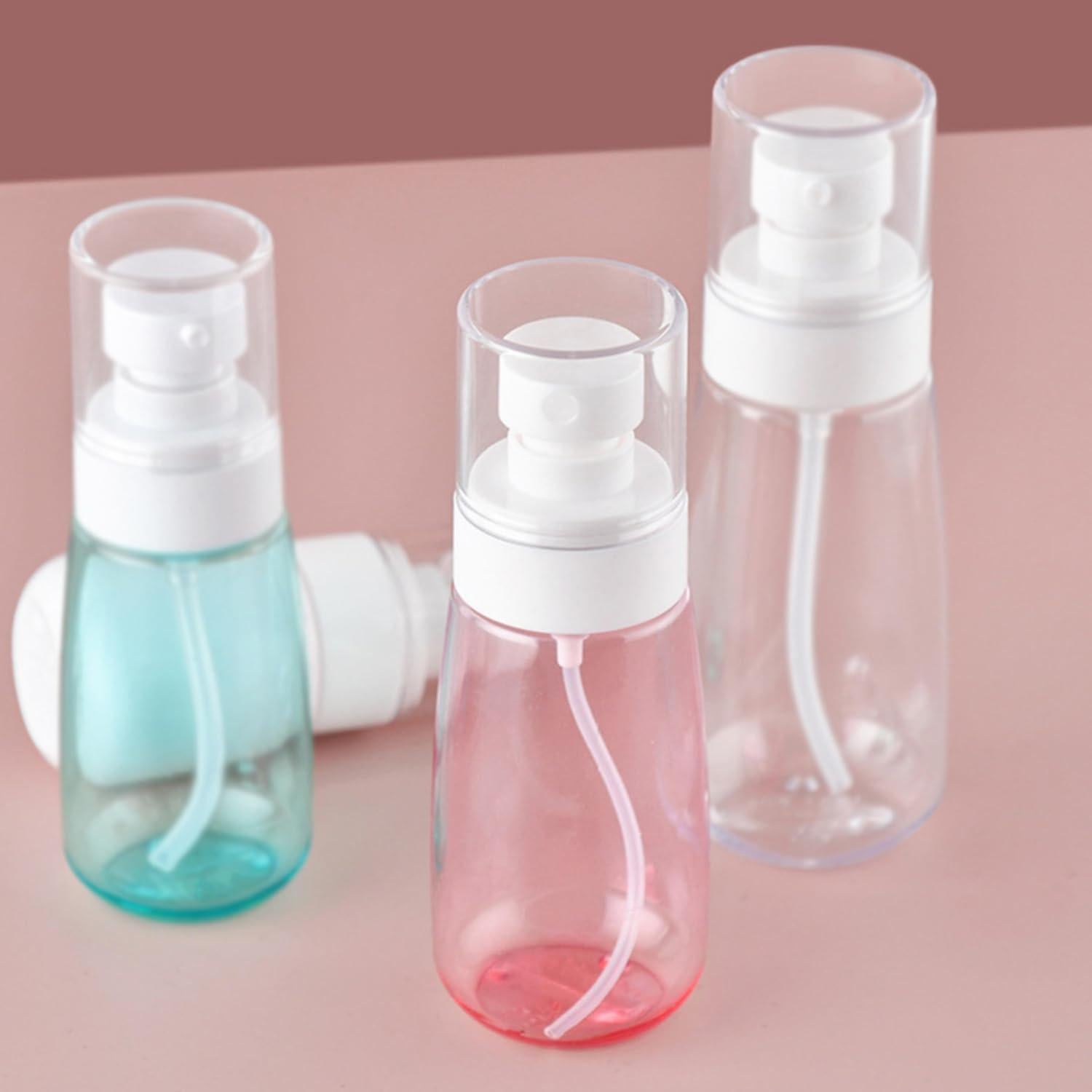 8 Botellas Spray de Viaje 60ml Doromy Rosa Reutilizables