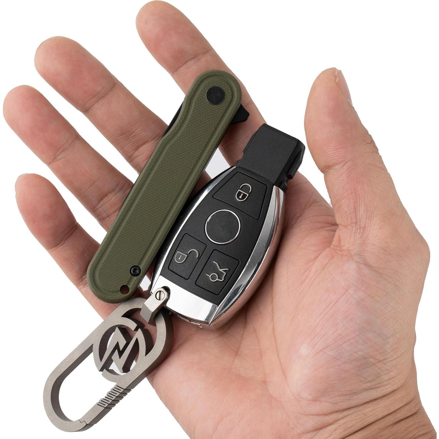 Cuchillo de bolsillo OLITANS G040, acero D2 6.99 cm, mango G10