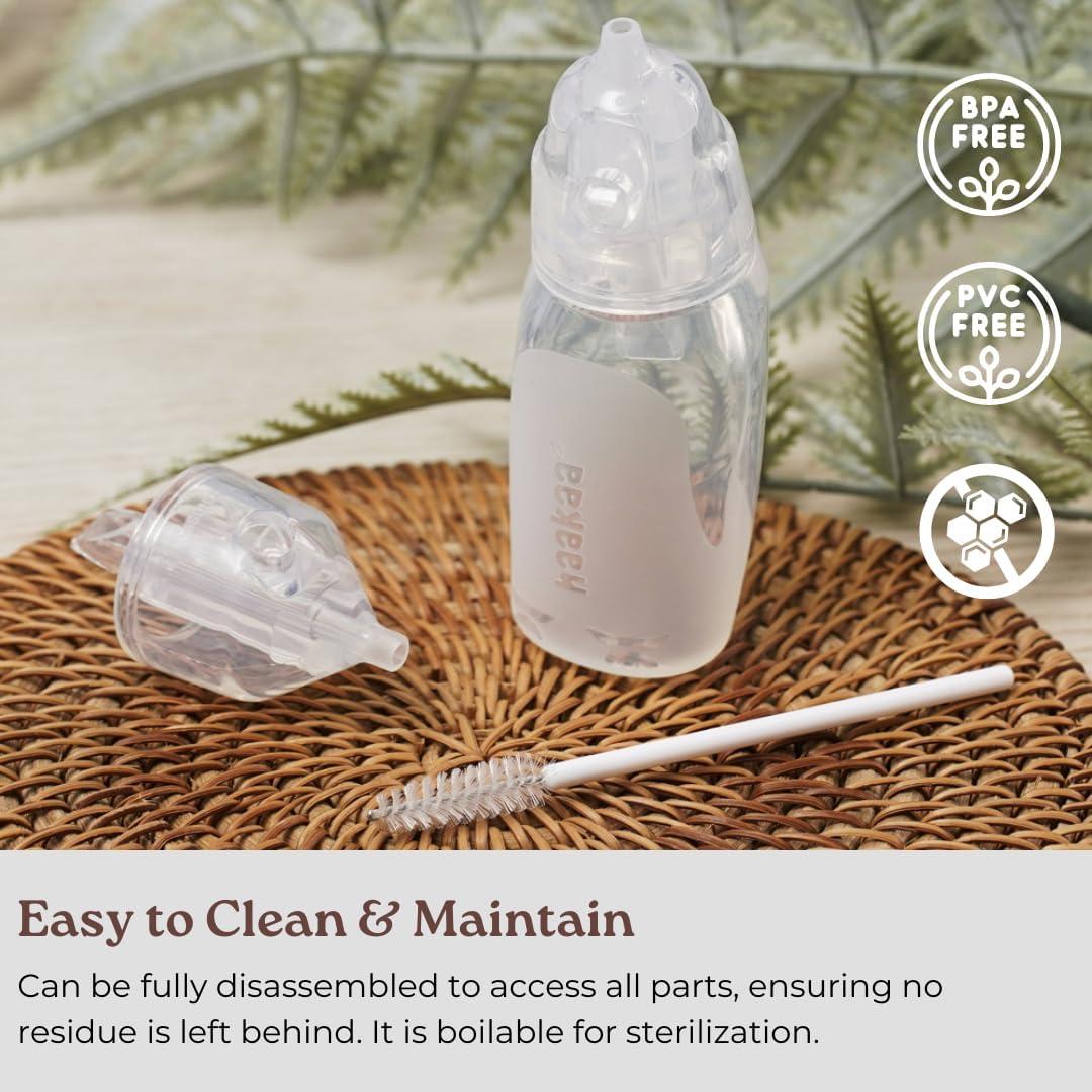 Aspirador Nasal Haakaa Pingüino para Bebés - Silicona Grado Alimenticio