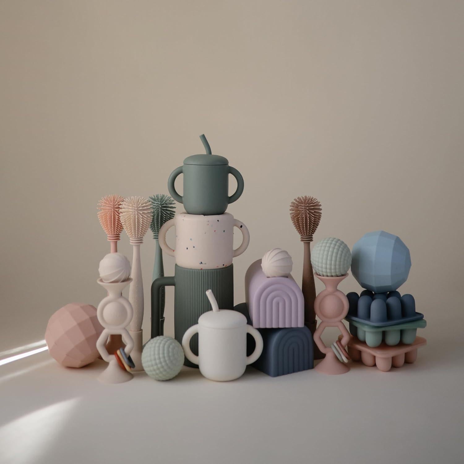 Cepillo de Biberón Mushie Doble Cara Silicona Suave Arena