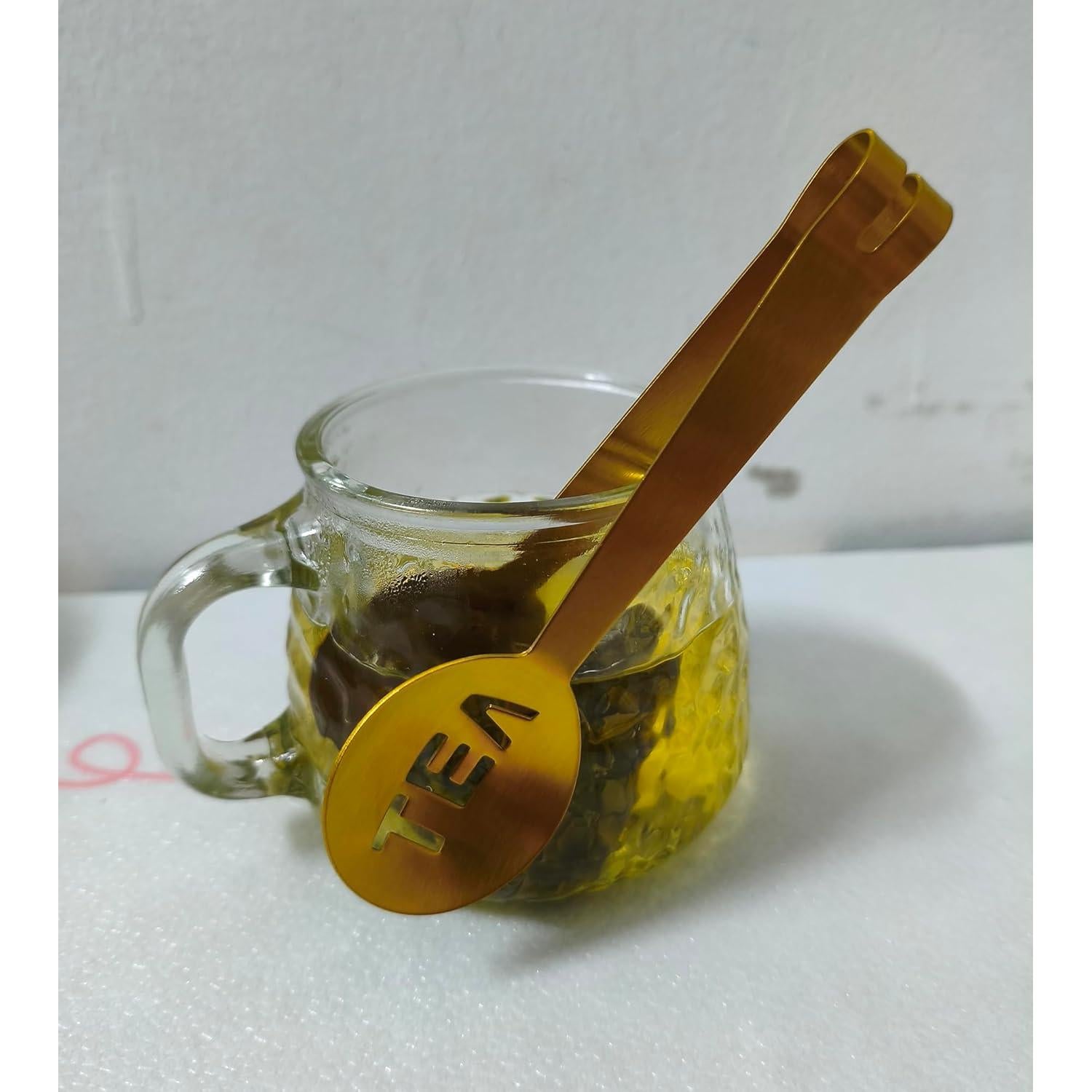 Prensador de Bolsitas de Té Genérico Acero Inoxidable Dorado