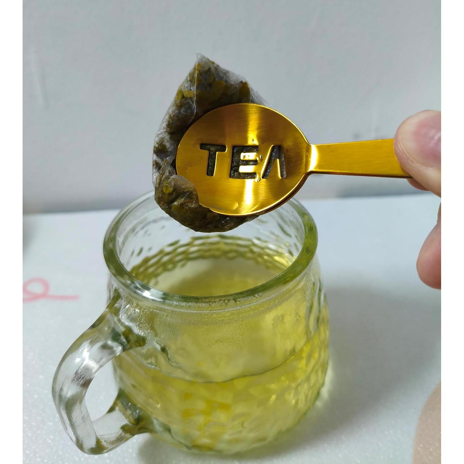 Prensador de Bolsitas de Té Genérico Acero Inoxidable Dorado