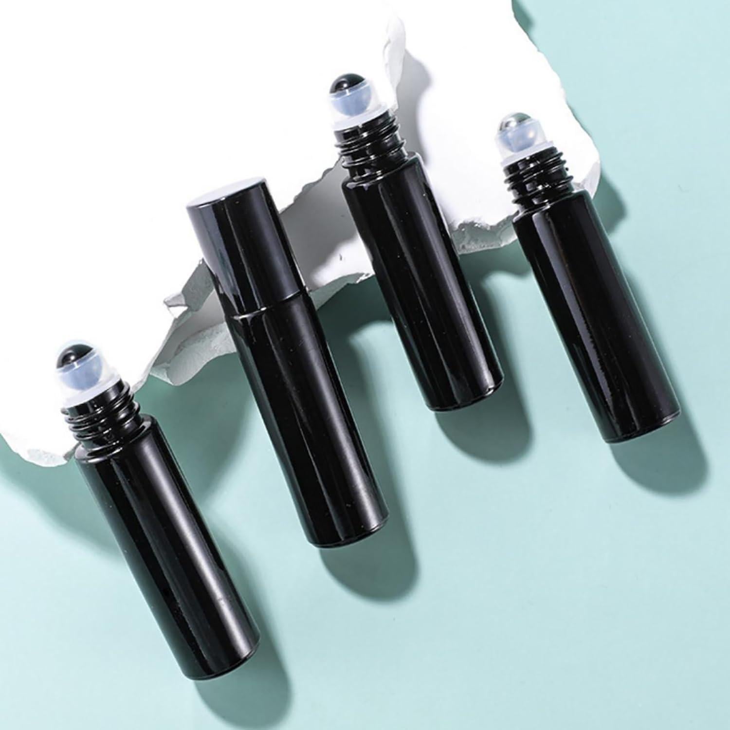 16 Botellas de Aceite Esencial Negras 10ml Doromy con Rodillo