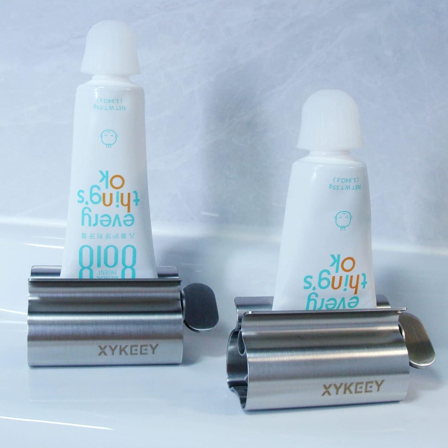 Exprimidor de Tubos de Pasta de Dientes XYKEEY - Juego de 2 Soportes de Metal