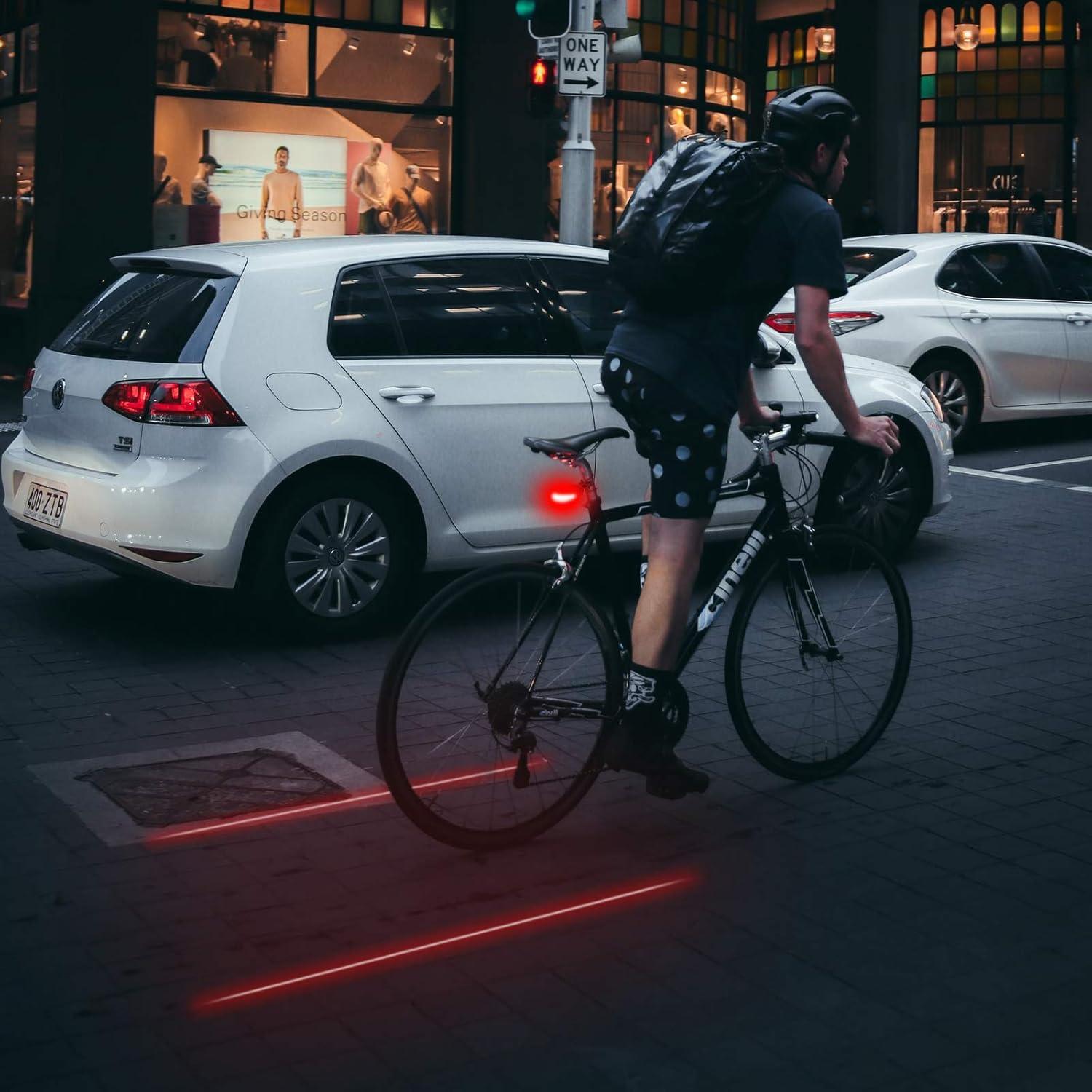 Luz Trasera de Bicicleta EWUHRY con 5 LED y 2 Rayos Láser