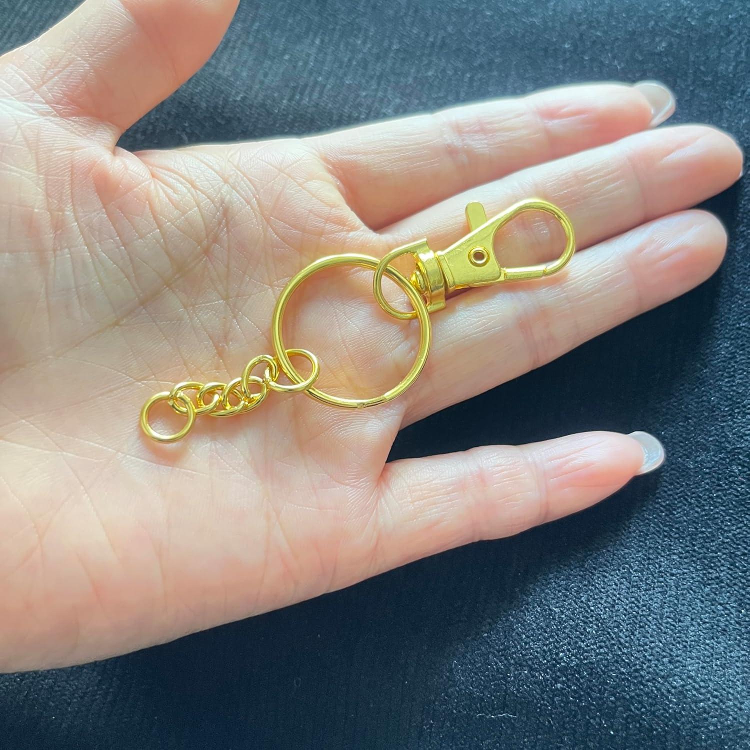 100 Ganchos Giratorios y Anillos de Llave Segauin Oro