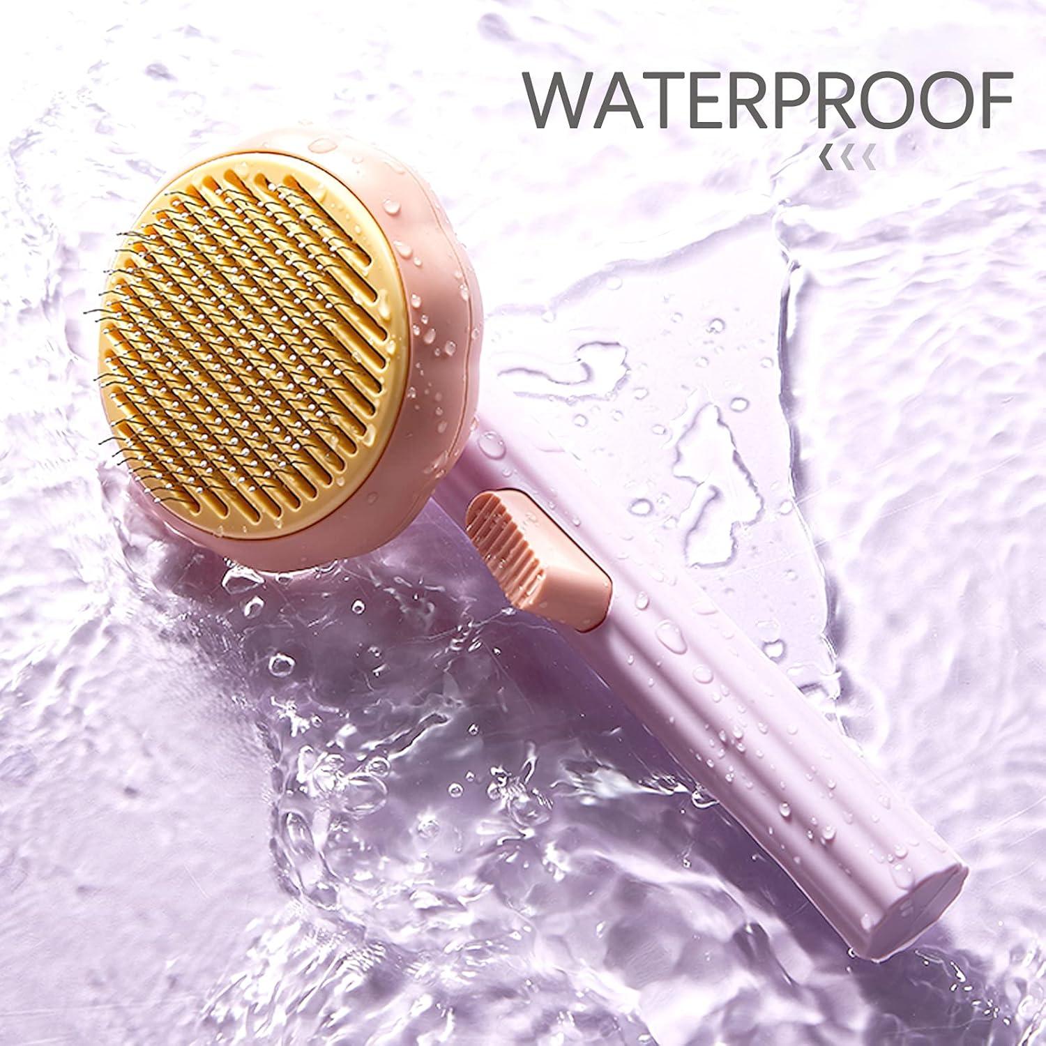 Cepillo de Aseo Autolimpiante para Gatos y Perros - Naranja/Rosa