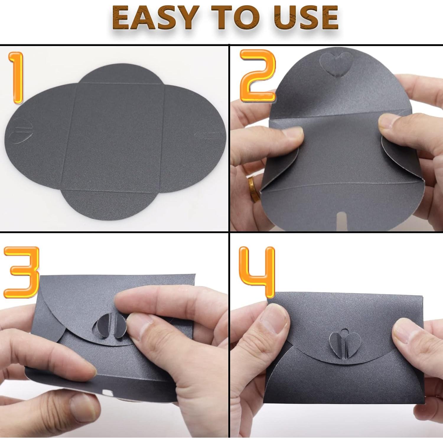 32 Mini Sobres de Papel Negro Joyangy con Cierre Corazón 100x70mm