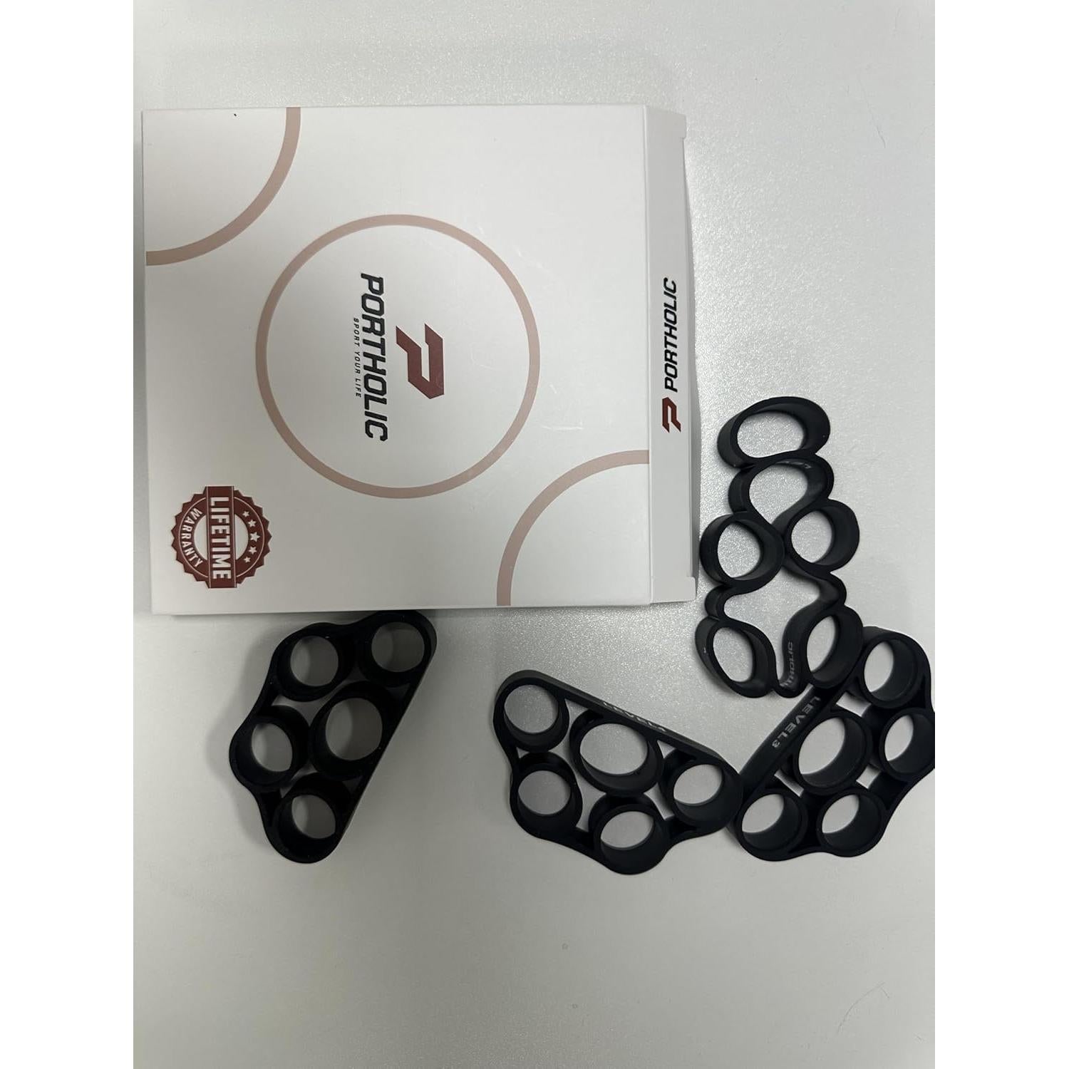 Ejercitador de Mano PORTHOLIC 4 Niveles Resistencia 3.63-9.53 kg