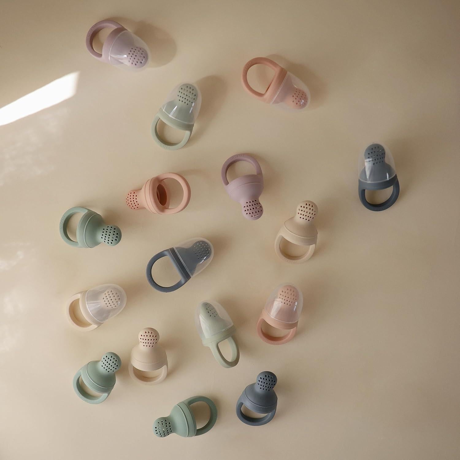 Chupete de Alimentación de Silicona Mushie Rosa 6 Meses+