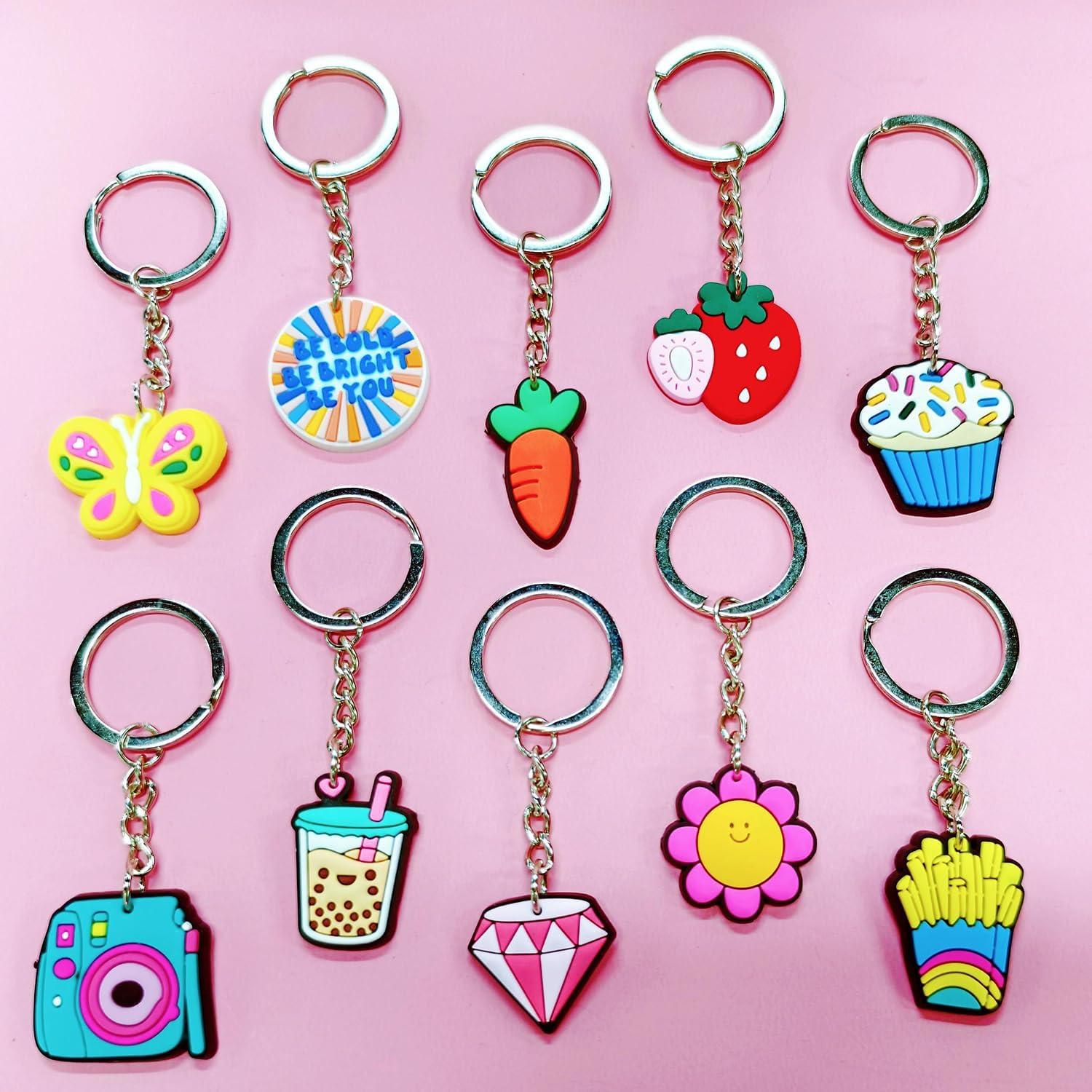 Lote de 20 llaveros variados Papacharms para fiesta y premios